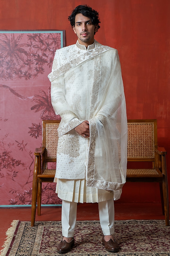 Off-white Cotton Silk & Raw Silk Hand Embellished Sherwani Set by AYUSH JAIN