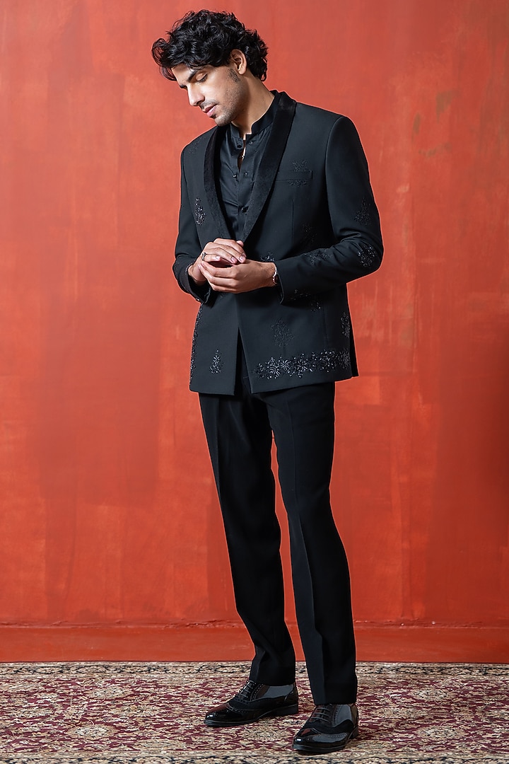 Black Suiting & Velvet Hand Embroidered Tuxedo Jacket by AYUSH JAIN at Pernia's Pop Up Shop