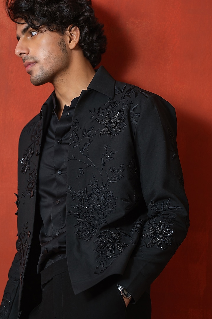 Black Suiting Floral Embroidered Tuxedo Shacket by AYUSH JAIN at Pernia's Pop Up Shop