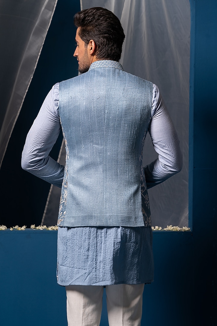 Blue Silk Floral Hand Embroidered Bundi Jacket by AYUSH JAIN at Pernia's Pop Up Shop