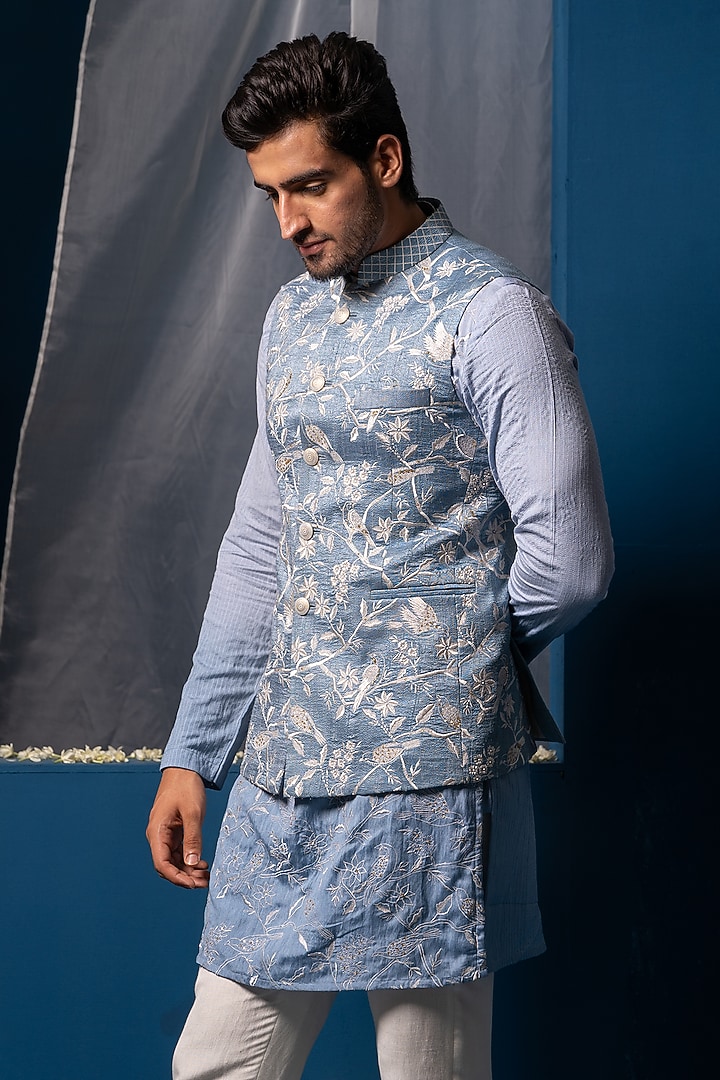 Blue Silk Floral Hand Embroidered Bundi Jacket by AYUSH JAIN at Pernia's Pop Up Shop