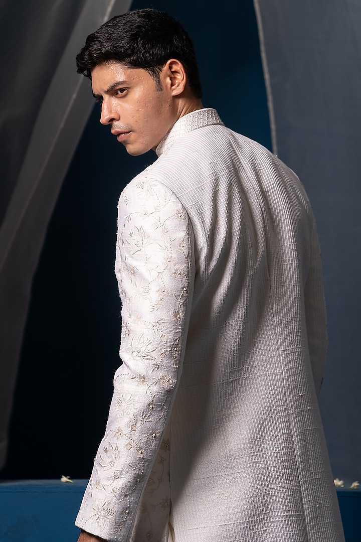 Ivory Raw Silk & Cotton Silk Hand Embroidered Groom Sherwani Set by AYUSH JAIN at Pernia's Pop Up Shop