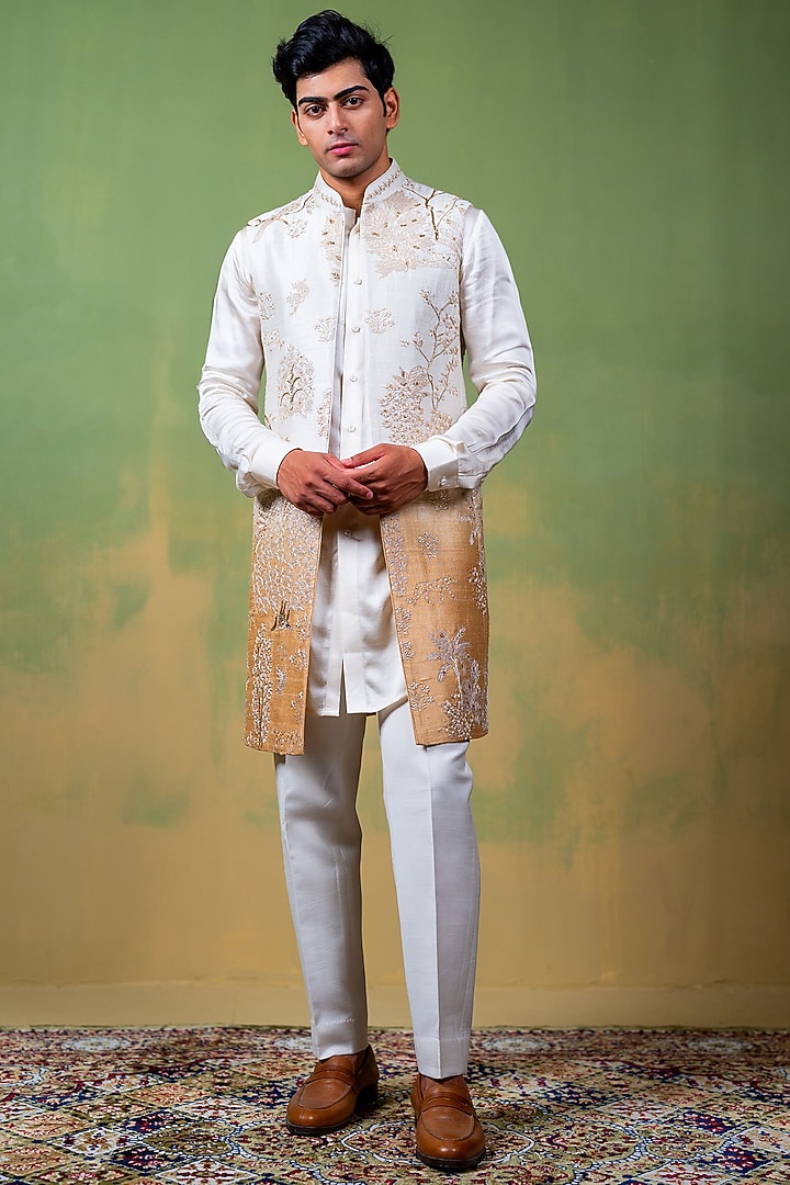 Ivory-Gold Raw Silk Zardosi Embroidered Long Bundi Jacket by AYUSH JAIN