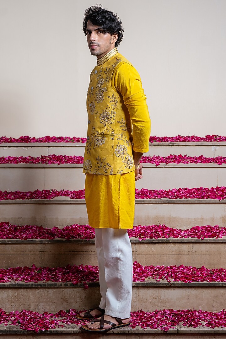 Yellow Silk Hand Embellished Bundi Jacket by AYUSH JAIN at Pernia's Pop Up Shop