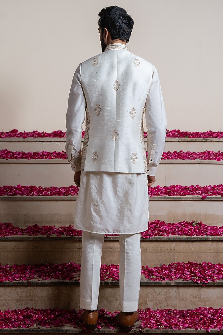 Ivory Silk Jaal Embroidered Bundi Jacket by AYUSH JAIN at Pernia's Pop Up Shop