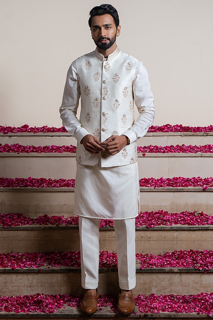 Ivory Silk Jaal Embroidered Bundi Jacket by AYUSH JAIN at Pernia's Pop Up Shop