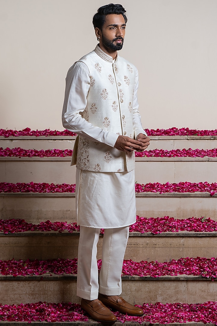 Ivory Silk Jaal Embroidered Bundi Jacket by AYUSH JAIN at Pernia's Pop Up Shop