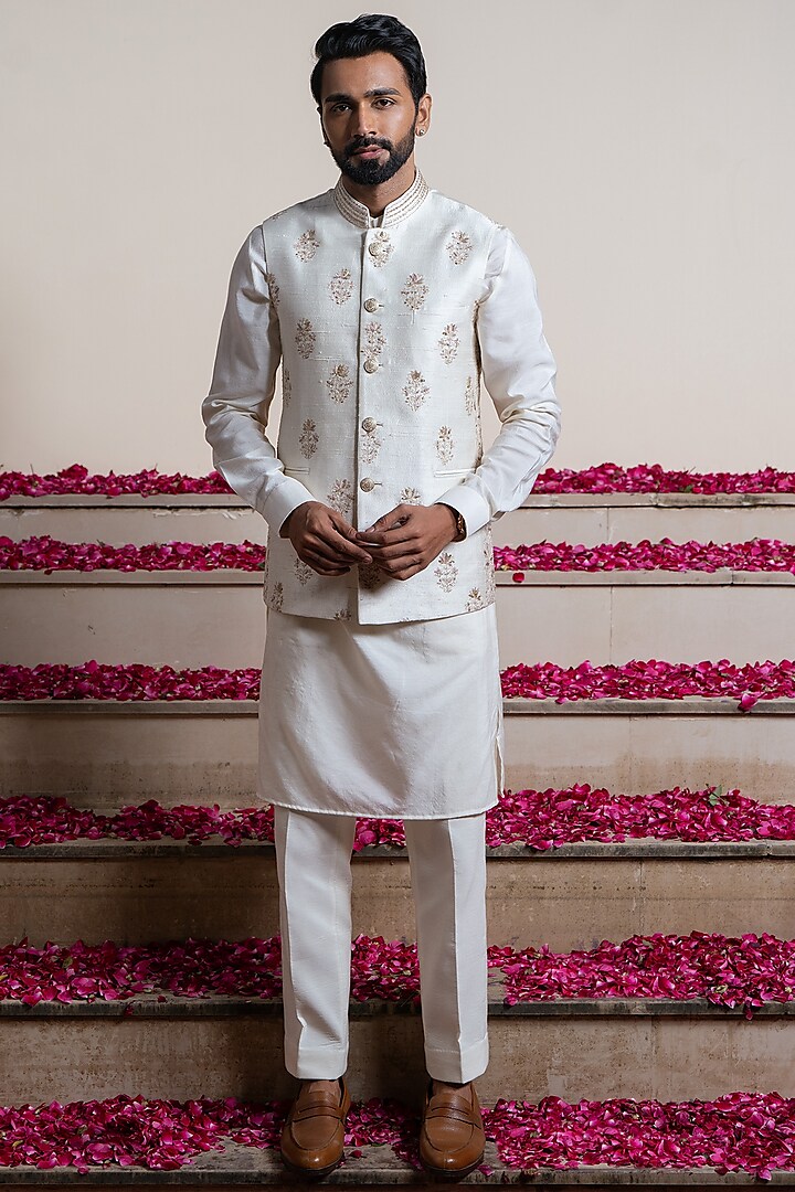 Ivory Silk & Cotton Silk Jaal Embroidered Bundi Jacket With Kurta by AYUSH JAIN