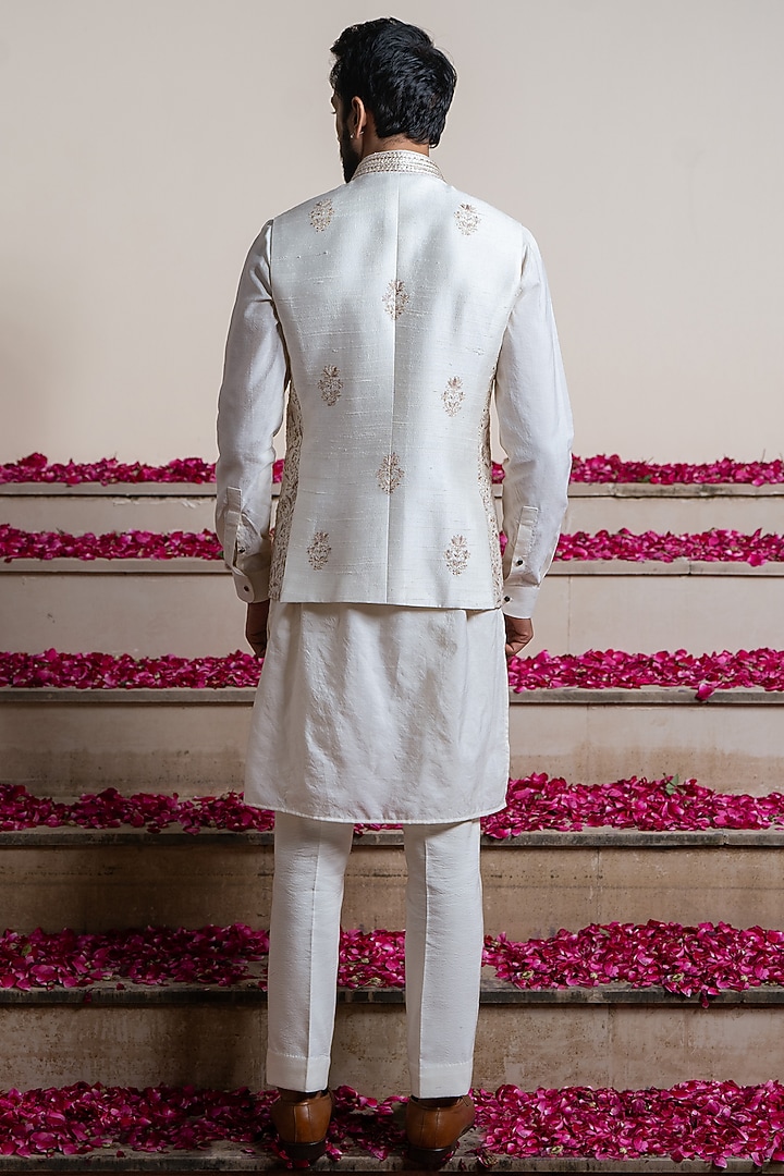 Ivory Silk & Cotton Silk Jaal Embroidered Bundi Jacket With Kurta by AYUSH JAIN at Pernia's Pop Up Shop