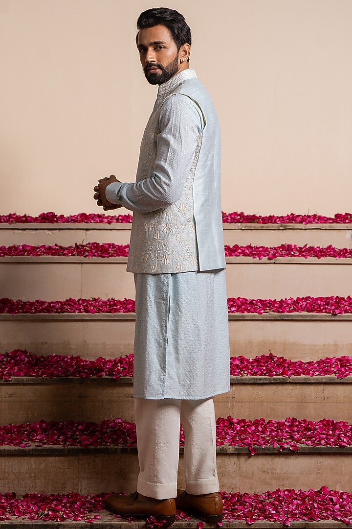 Ice Blue Silk & Cotton Silk Hand Embellished Bundi Jacket With Kurta by AYUSH JAIN at Pernia's Pop Up Shop