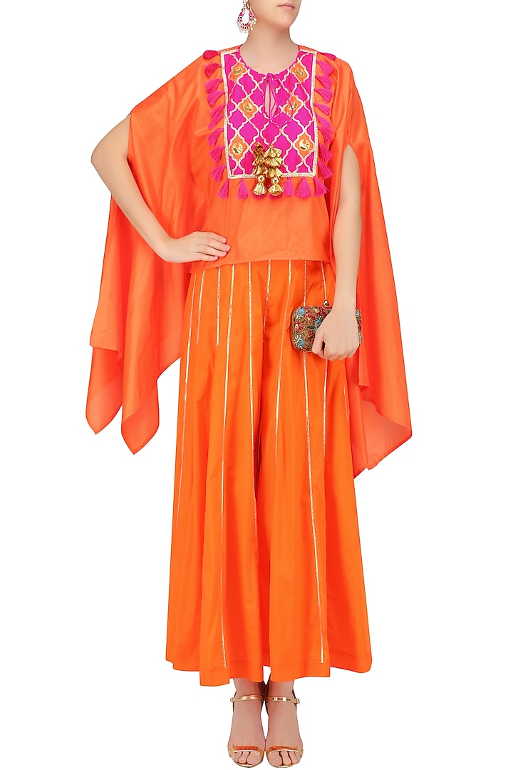 Orange and rani pink gota patti work cape with sharara pants available only at Pernia's Pop Up Shop.