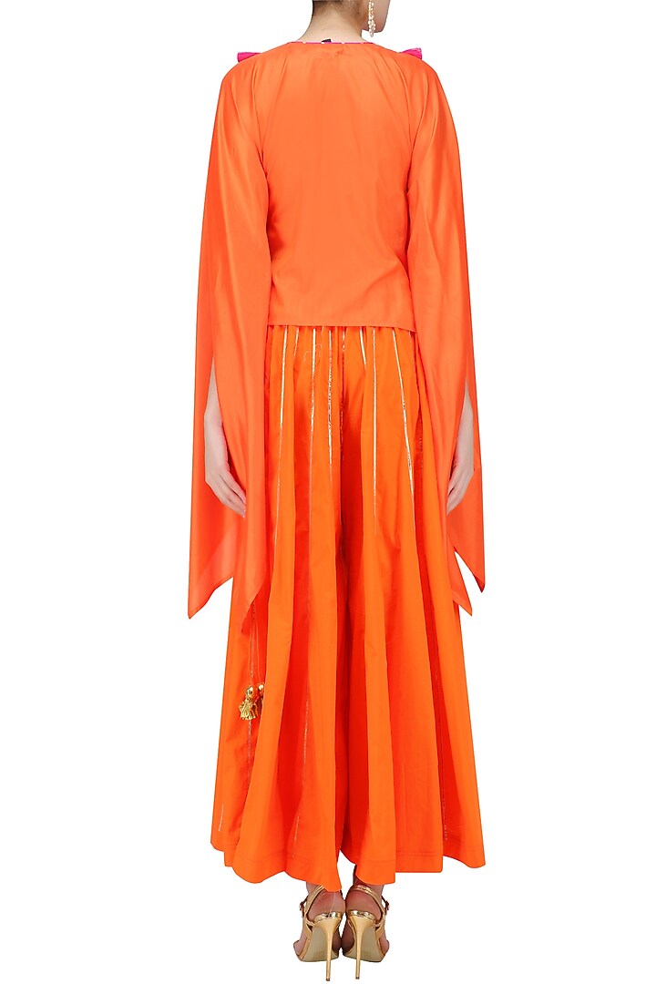 Orange and rani pink gota patti work cape with sharara pants available only at Pernia's Pop Up Shop.