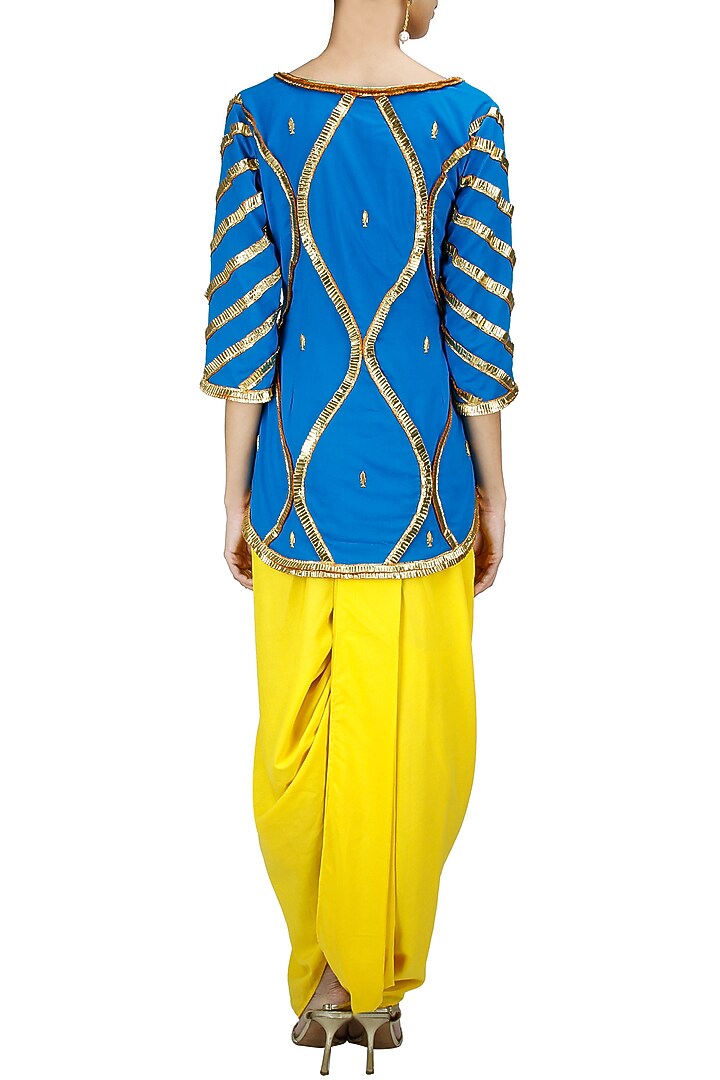 Fish jaal kurti with dhoti available only at Pernia's Pop-Up Shop.