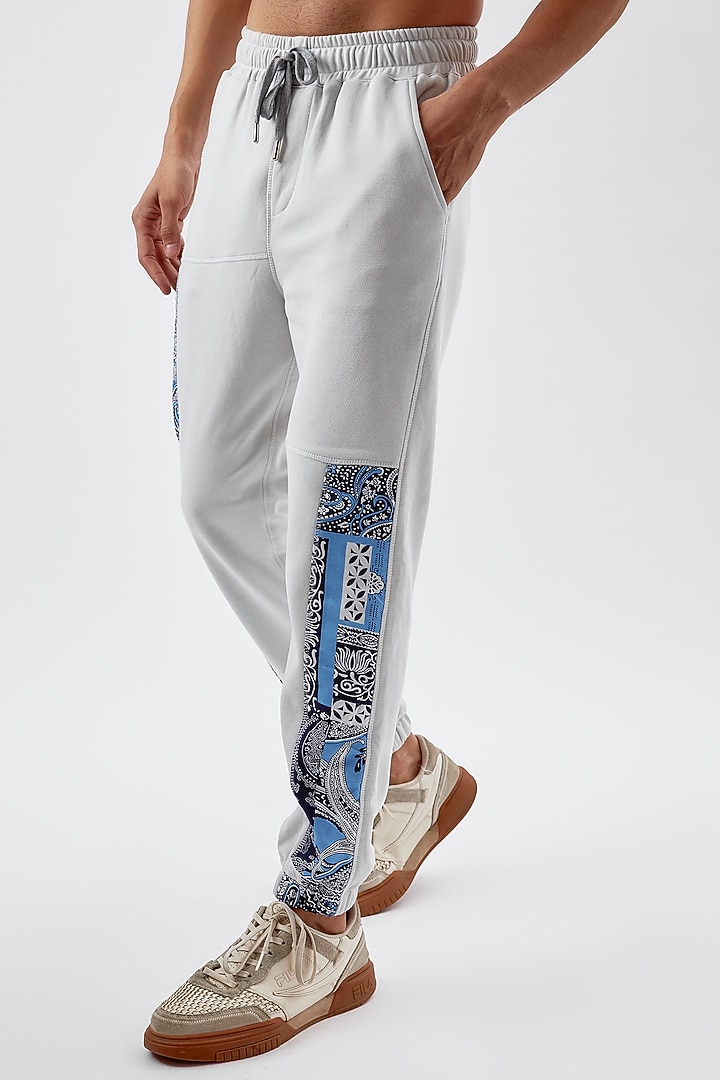 White Cotton Printed Jogger Pants by BACK ALLEY BODEGA at Pernia's Pop Up Shop