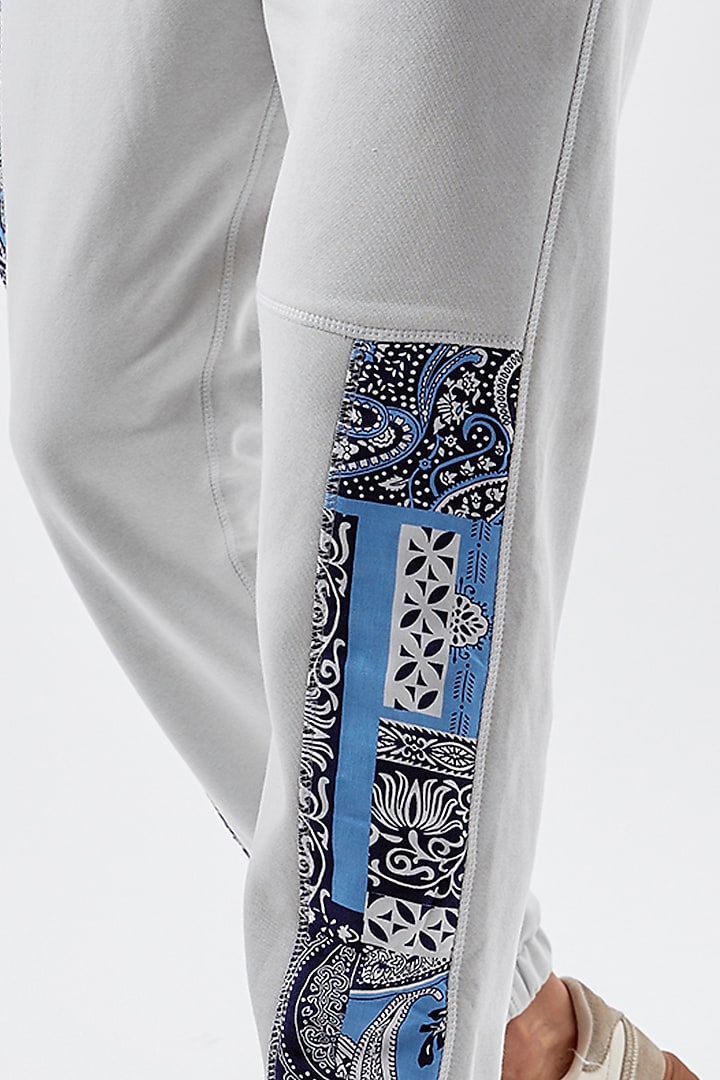 White Cotton Printed Jogger Pants by BACK ALLEY BODEGA at Pernia's Pop Up Shop