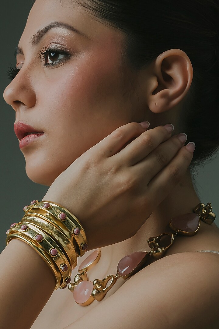 Gold Finish Pink Rhodonite Stone Adjustable Kada (Set Of 3) by Baala Jewels at Pernia's Pop Up Shop
