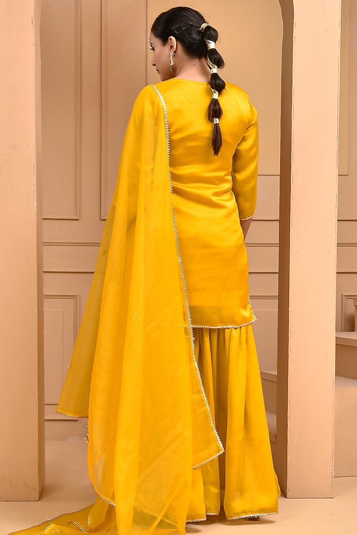 Yellow Satin Silk Flared Sharara Set by Bannhi by Priyanka Rathore at Pernia's Pop Up Shop
