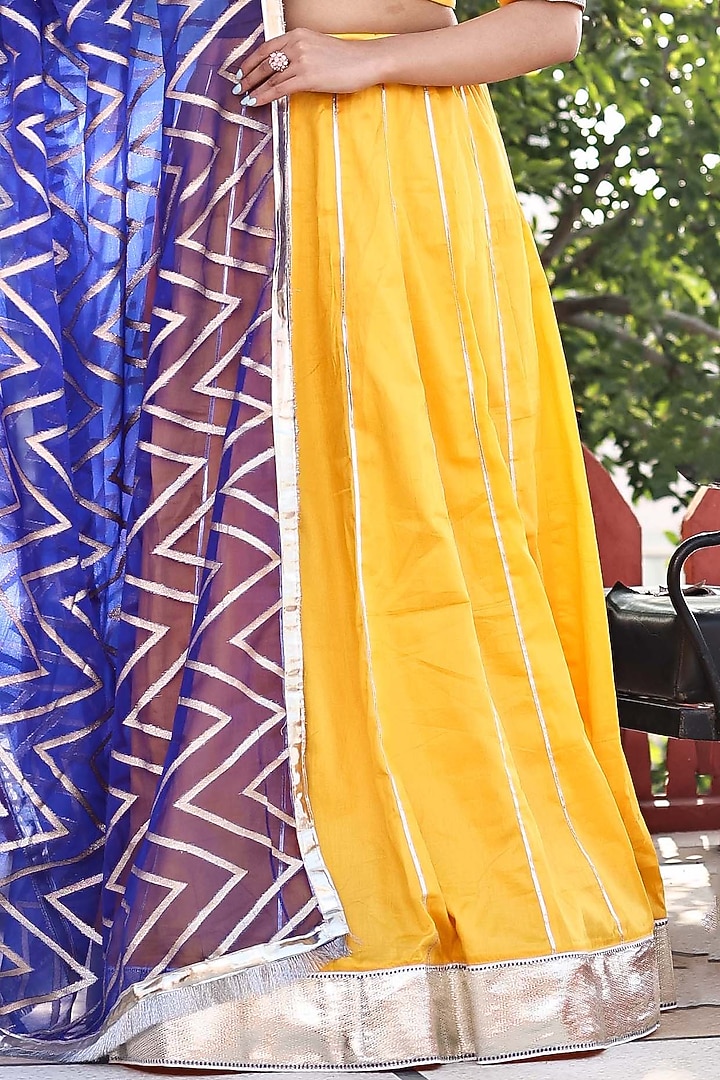 Yellow Cotton Silk Gota Work Kalidar Flared Lehenga Set by Bannhi by Priyanka Rathore at Pernia's Pop Up Shop
