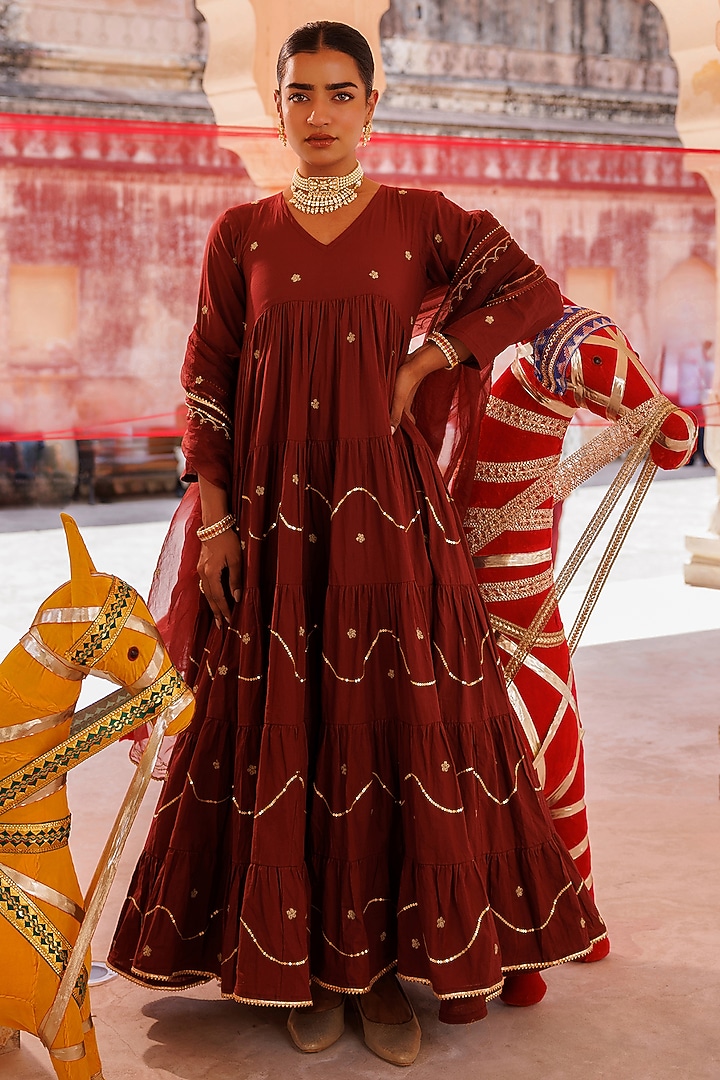 Maroon Cotton Aari Embroidered Tiered Party Wear Anarkali Set by Bannhi by Priyanka Rathore at Pernia's Pop Up Shop