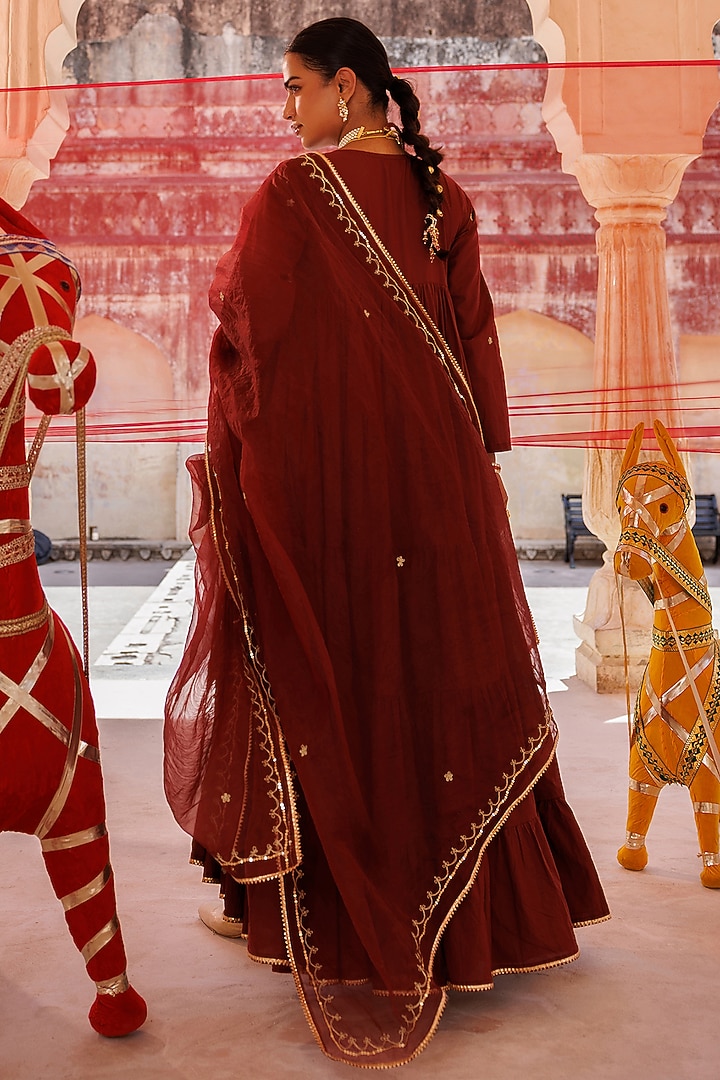 Maroon Cotton Aari Embroidered Tiered Party Wear Anarkali Set by Bannhi by Priyanka Rathore at Pernia's Pop Up Shop