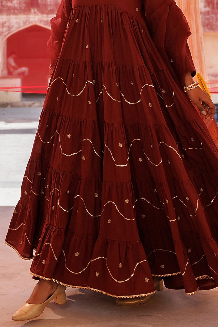 Maroon Cotton Aari Embroidered Tiered Party Wear Anarkali Set by Bannhi by Priyanka Rathore at Pernia's Pop Up Shop
