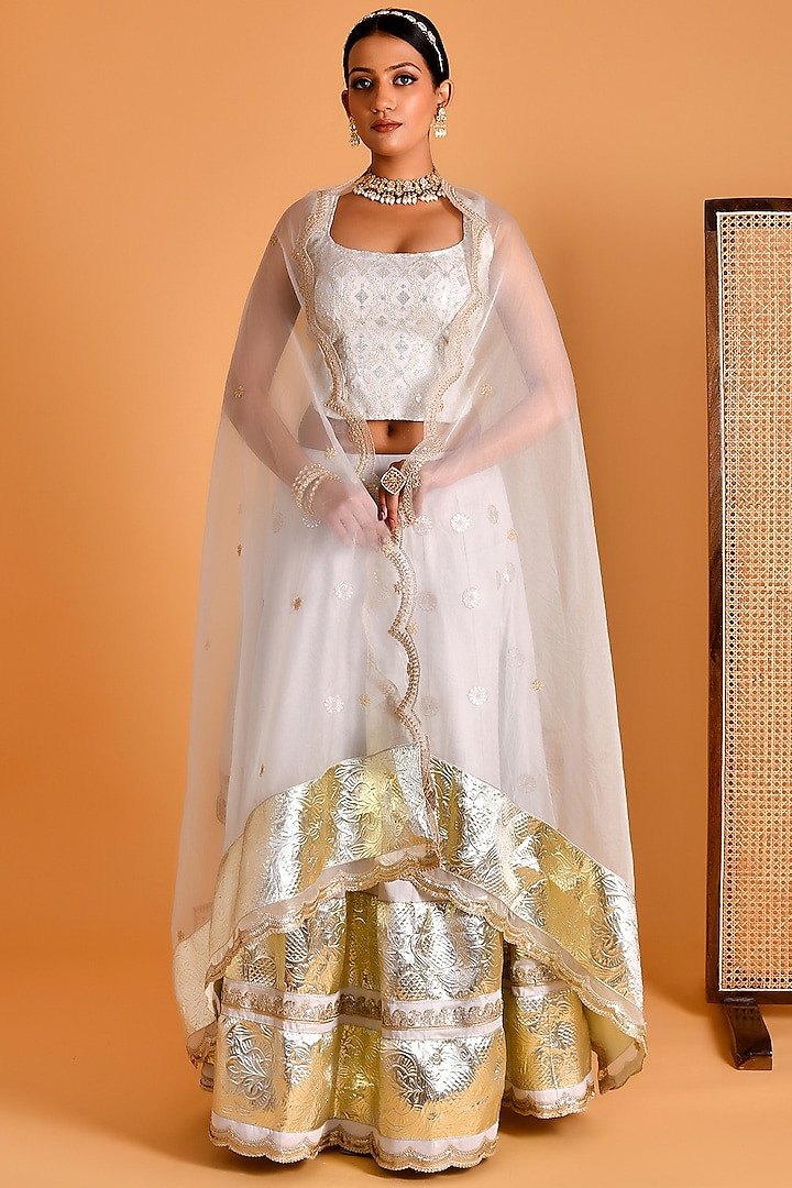 White Cotton Silk & Georgette Sequins Hand Embroidered Wedding Lehenga Set by Bannhi at Pernia's Pop Up Shop