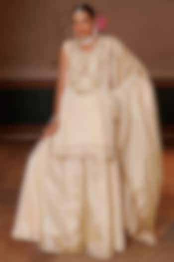 Ivory & Gold Tissue Party Wear Sharara Set by Bannhi by Priyanka Rathore at Pernia's Pop Up Shop