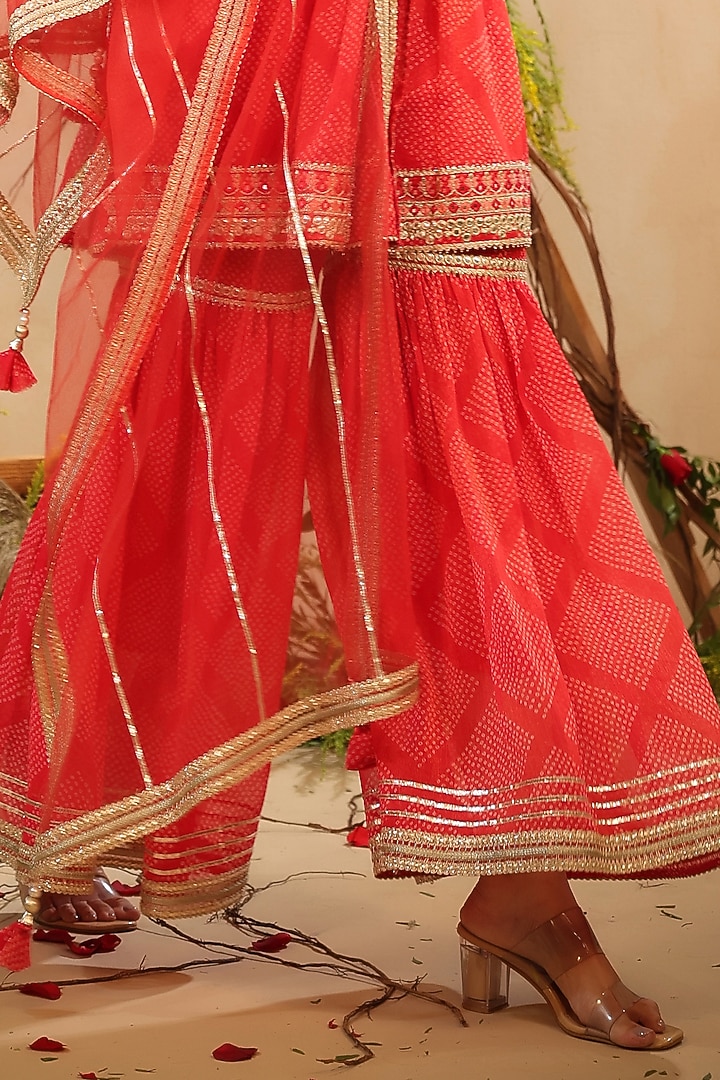 Red Muslin Embroidered Sharara Set by Bairaas at Pernia's Pop Up Shop