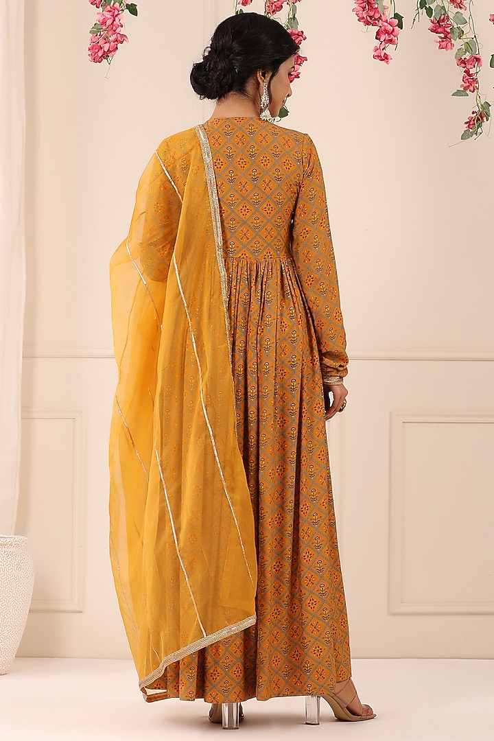 Mustard Muslin Printed Gown With Dupatta by Bairaas at Pernia's Pop Up Shop