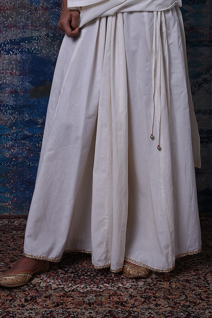 Off-White Cotton Sequins Embroidered Kurta Set by Barahmasi at Pernia's Pop Up Shop