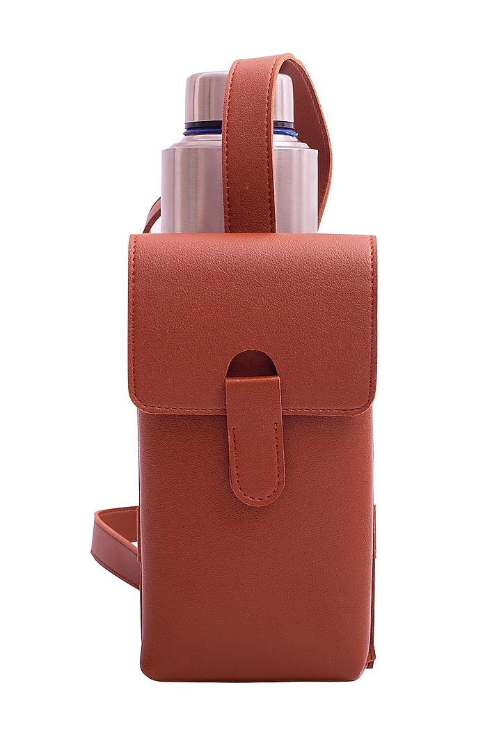 Orange Faux Leather Bottle Bag by Bombay Artisan Co. at Pernia's Pop Up Shop