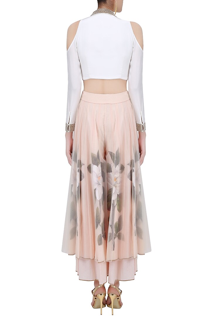 White pearl embroidered crop top with peach floral handpainted sharara pants available only at Pernia's Pop Up Shop.