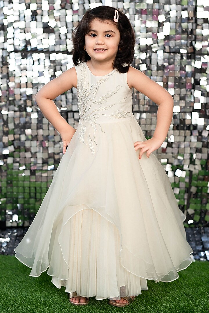 Ivory Asymmetrical Gown With Hair Accessory by Ba Ba Baby clothing co. at Pernia's Pop Up Shop
