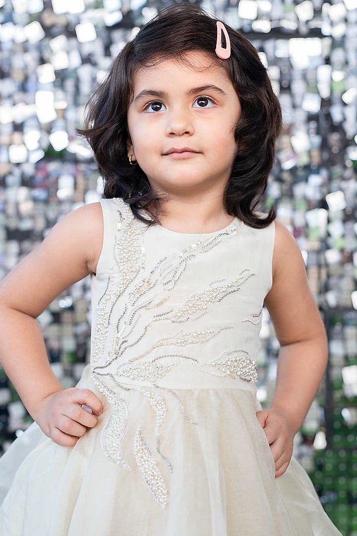 Ivory Asymmetrical Gown With Hair Accessory by Ba Ba Baby clothing co. at Pernia's Pop Up Shop