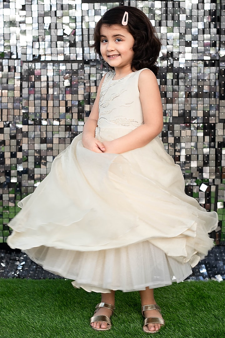 Ivory Asymmetrical Gown With Hair Accessory by Ba Ba Baby clothing co. at Pernia's Pop Up Shop