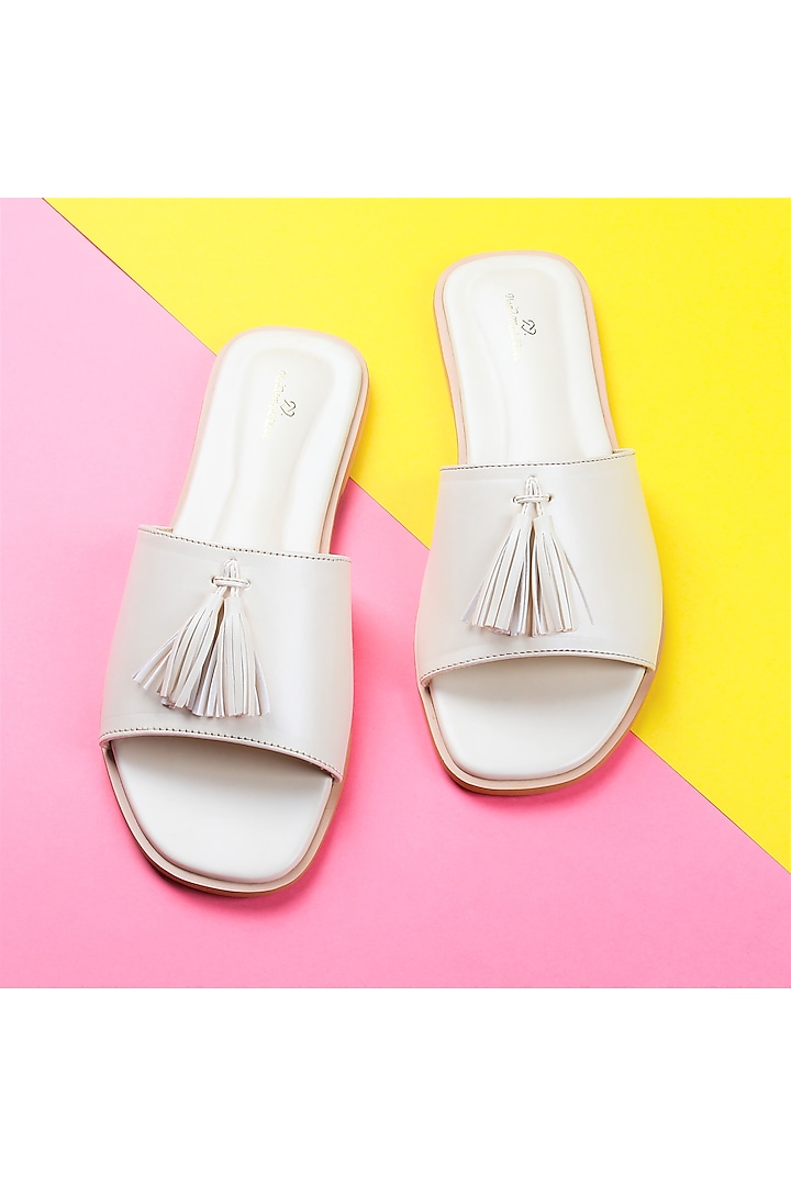White Flat Sliders With Tassels by Bombay Brown