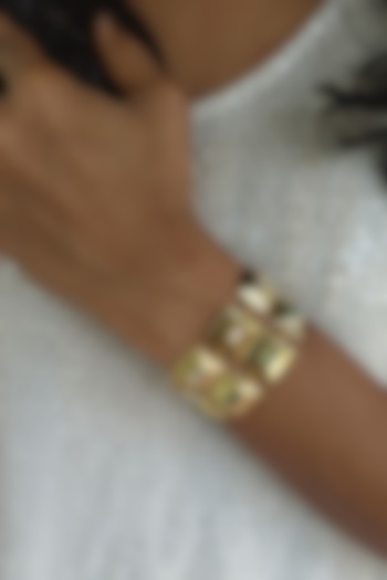 Gold Finish Baguette Crystals Tennis Bracelet by BBLINGG at Pernia's Pop Up Shop