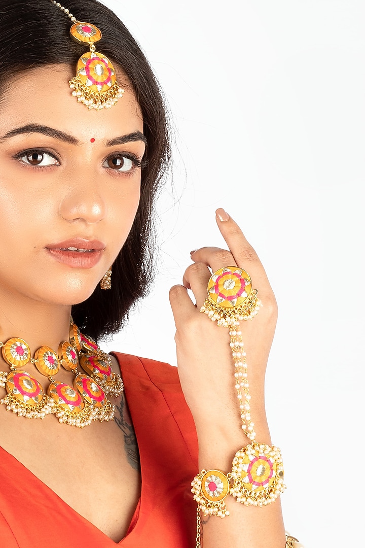 Gold Finish Pink & Mustard Yellow Embroidered Hathphool by Bauble Bazaar at Pernia's Pop Up Shop