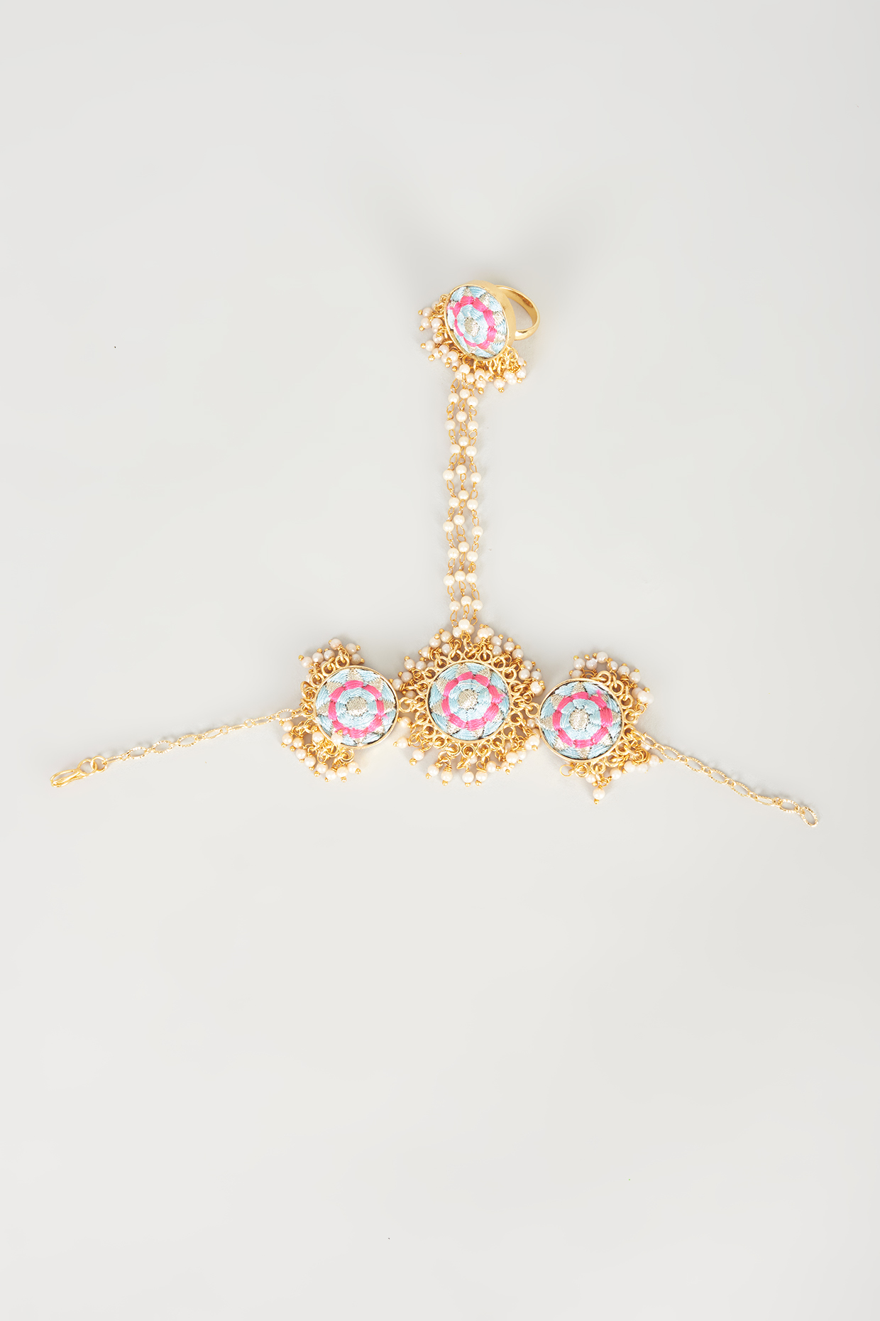 Gold Finish Embroidered Circular Haathphool by Bauble Bazaar at Pernia's Pop Up Shop