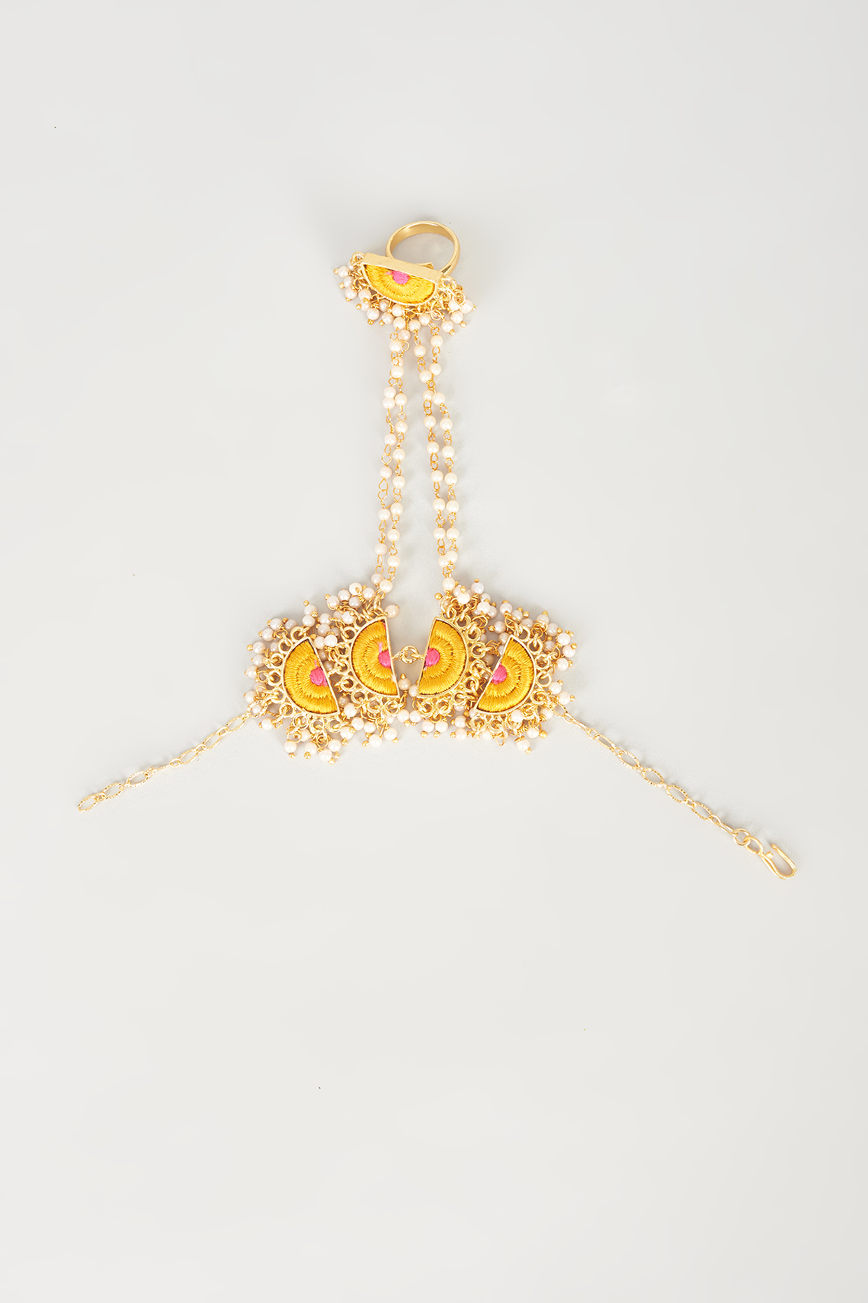 Gold Finish Embroidered Semi-Circular Haathphool by Bauble Bazaar at Pernia's Pop Up Shop