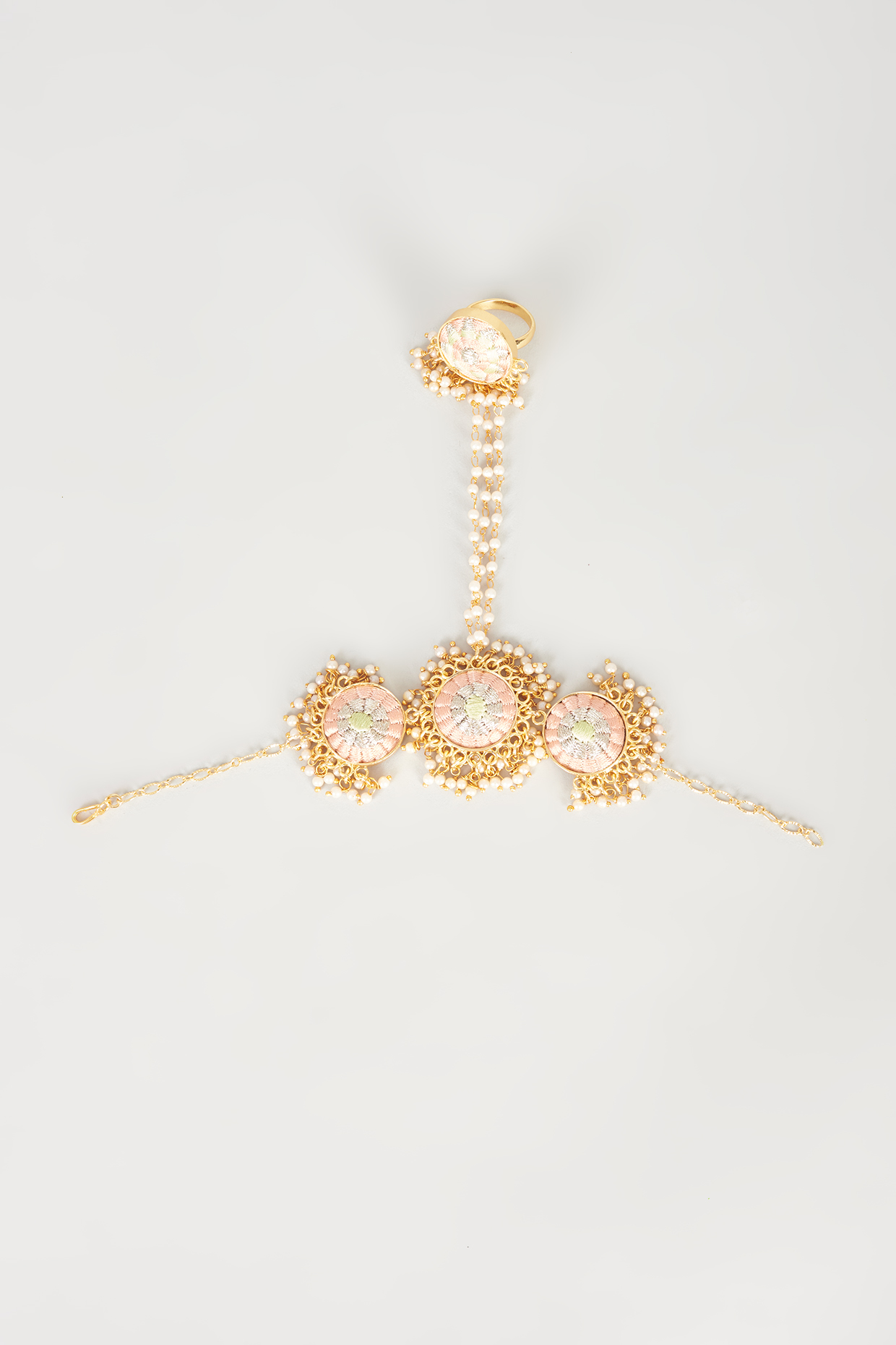 Gold Finish Embroidered Circular Haathphool by Bauble Bazaar at Pernia's Pop Up Shop