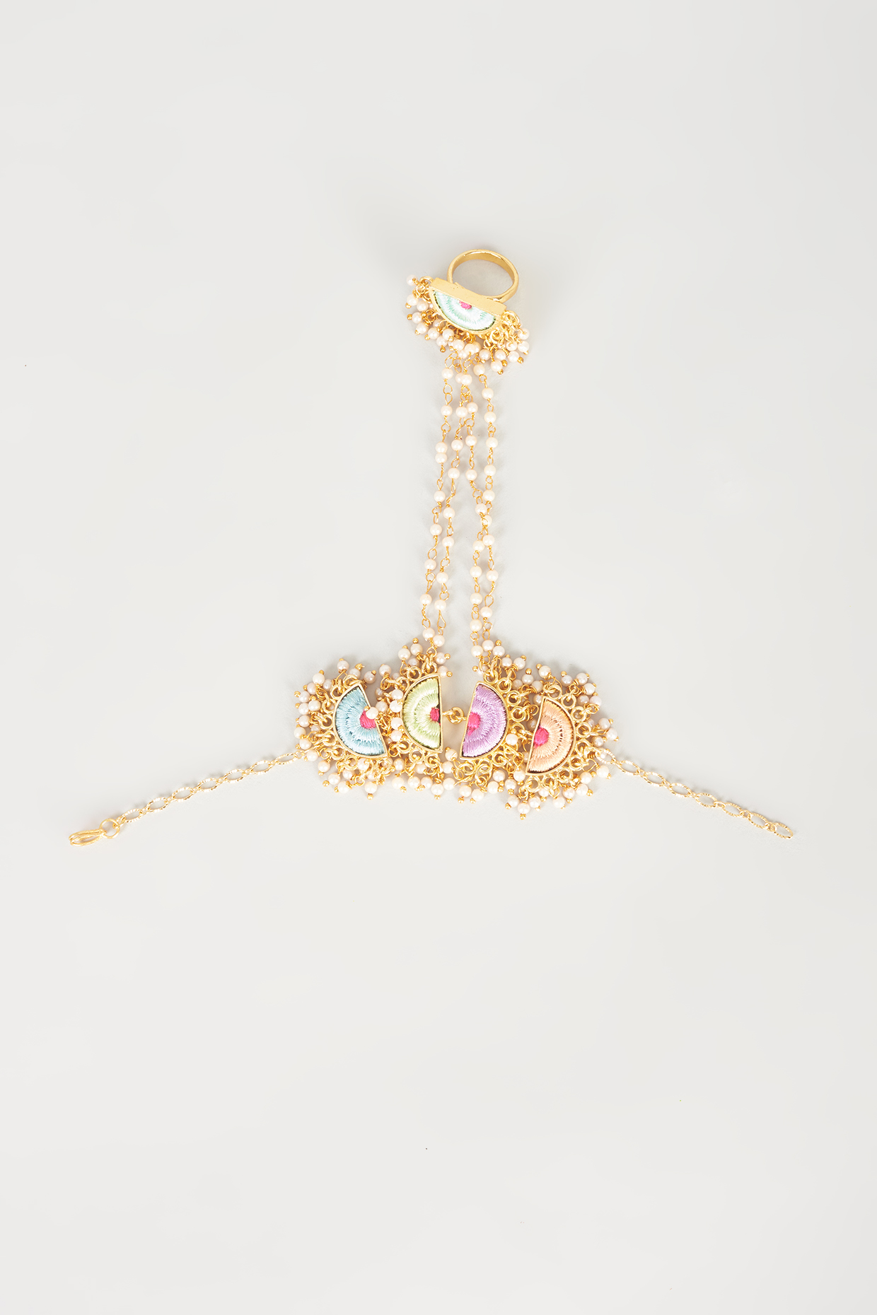 Gold Finish Embroidered Semi-Circular Haathphool by Bauble Bazaar at Pernia's Pop Up Shop