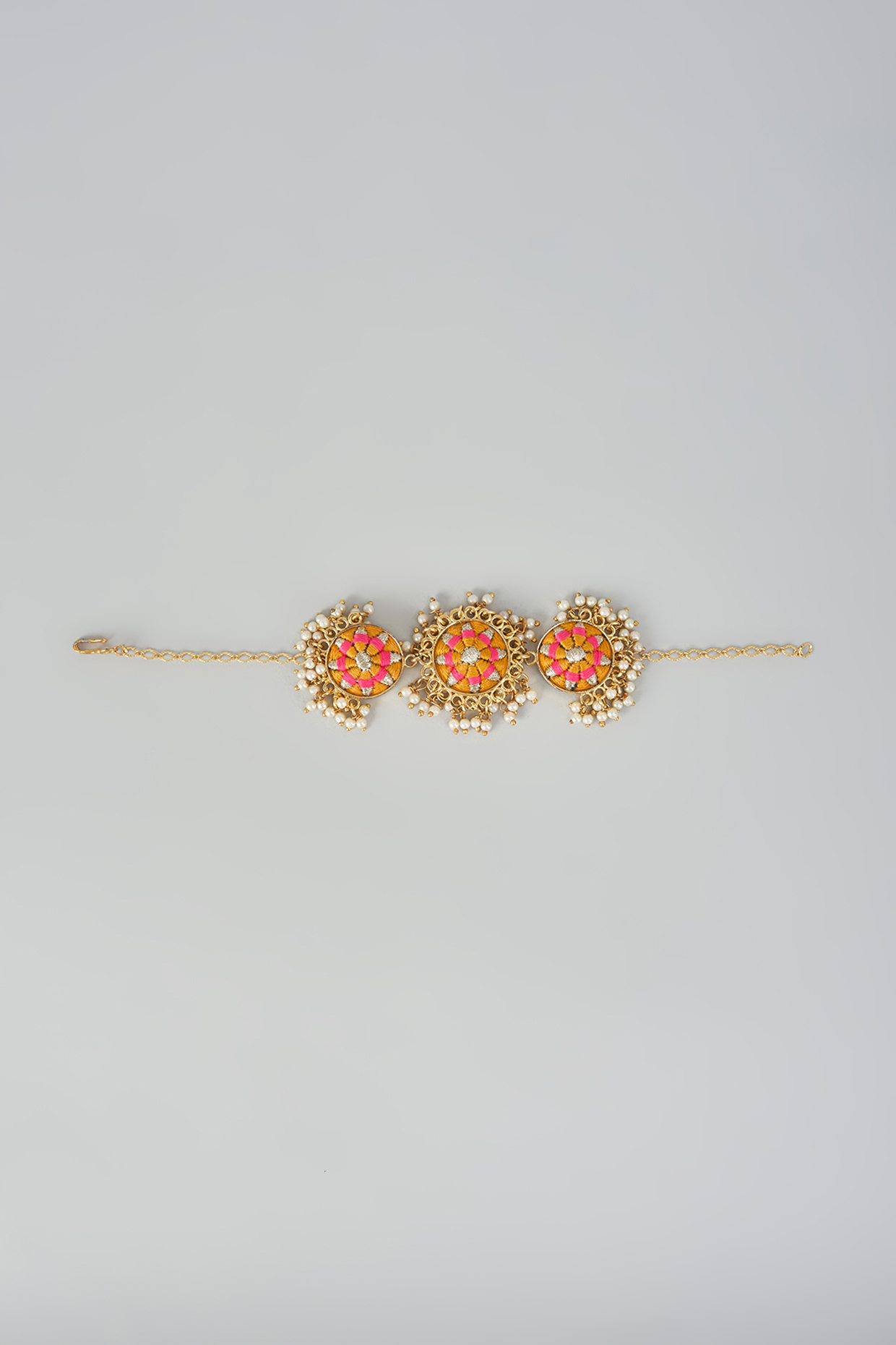 Gold Finish Embellished Bracelet by Bauble Bazaar at Pernia's Pop Up Shop