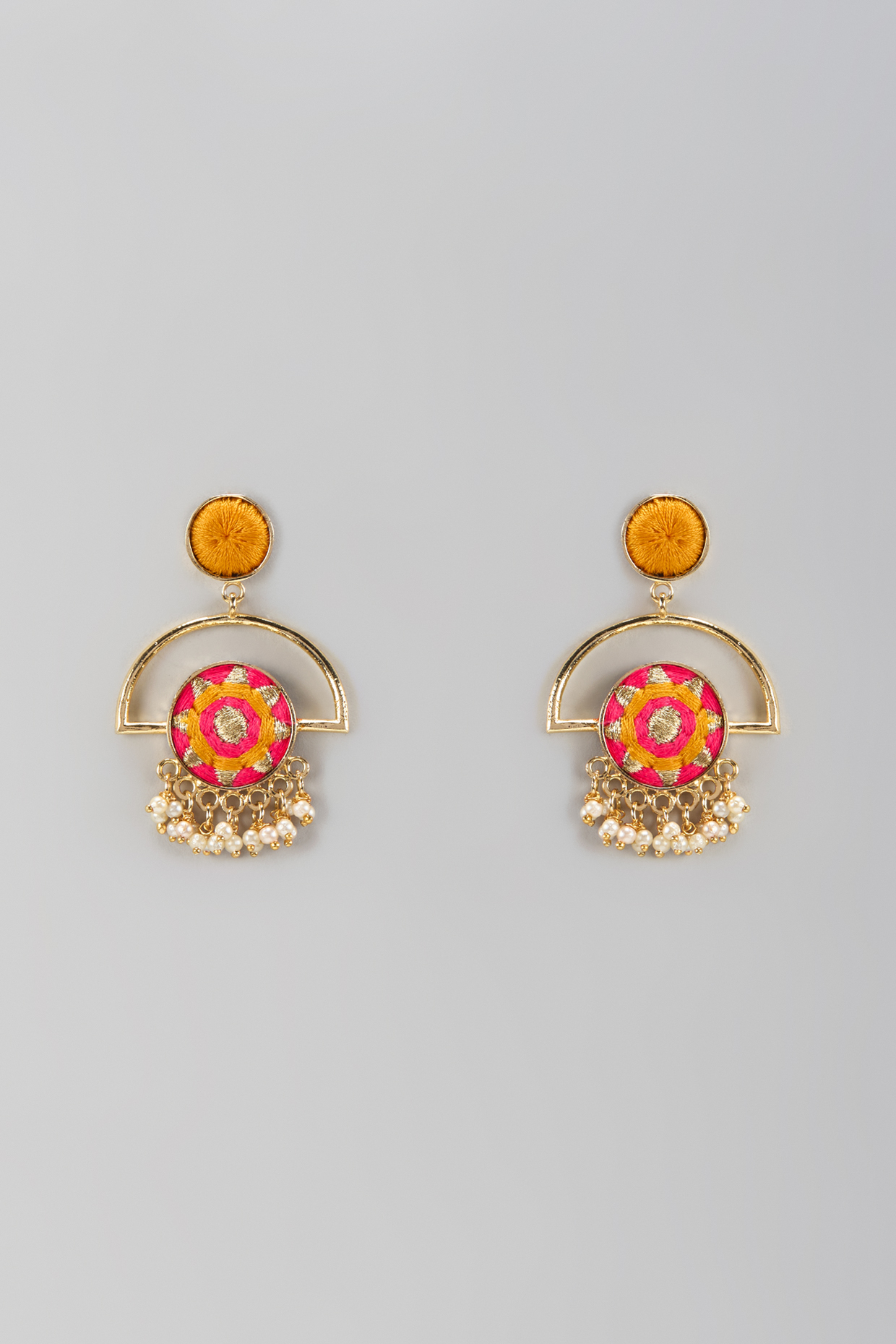 Matte Gold Finish Thread Embroidered Circular Pipe Earrings by Bauble Bazaar at Pernia's Pop Up Shop