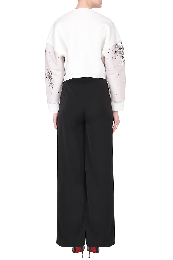 White embroidered drop shoulder sweatshirt available only at Pernia's Pop Up Shop.