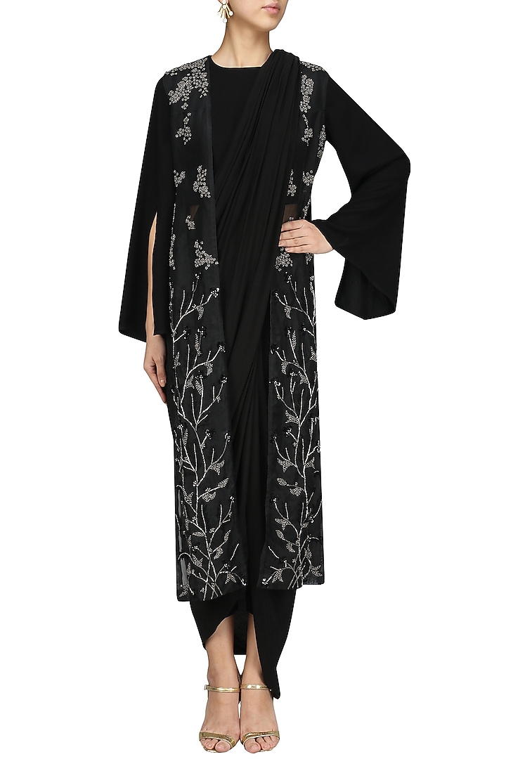 Black drape saree with backless vest set available only at Pernia's Pop Up Shop.