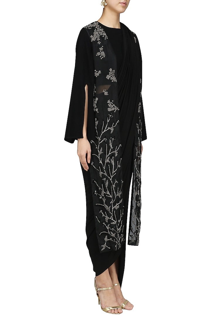 Black drape saree with backless vest set available only at Pernia's Pop Up Shop.