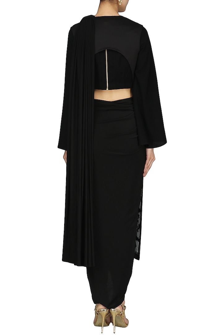Black drape saree with backless vest set available only at Pernia's Pop Up Shop.