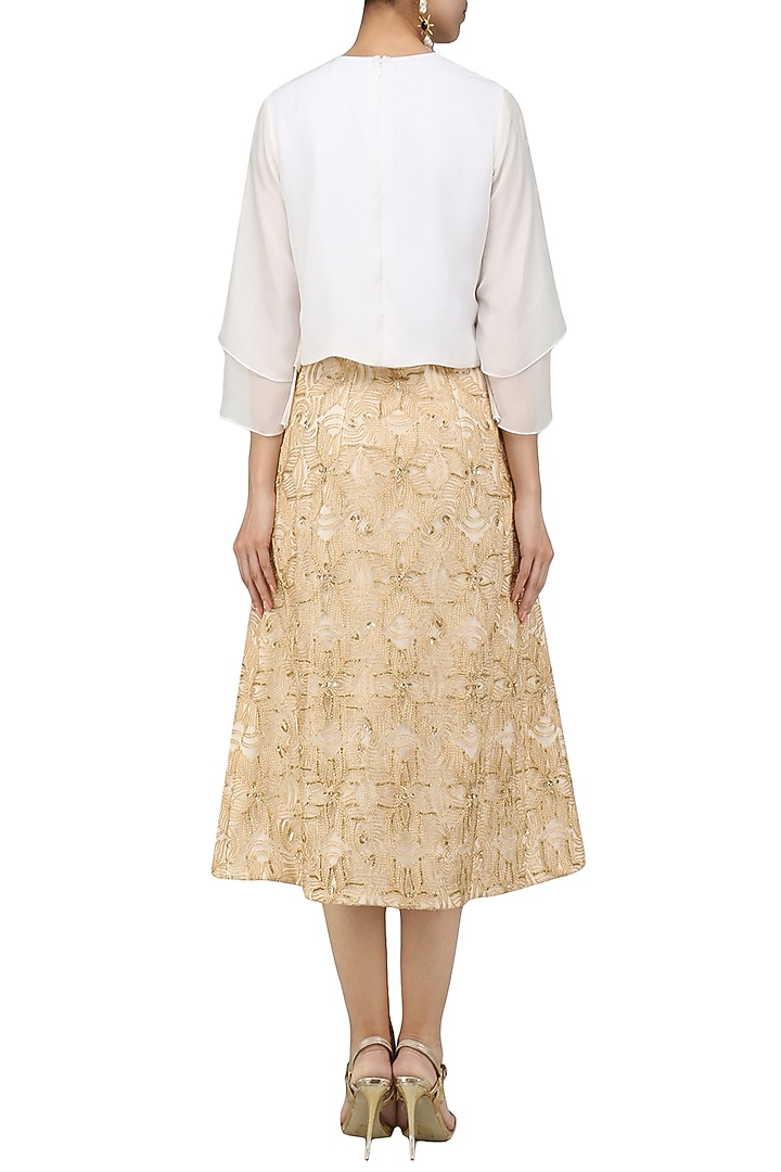 Beige Glistening sunset skirt with Ivory flounce crop top available only at Pernia's Pop Up Shop.
