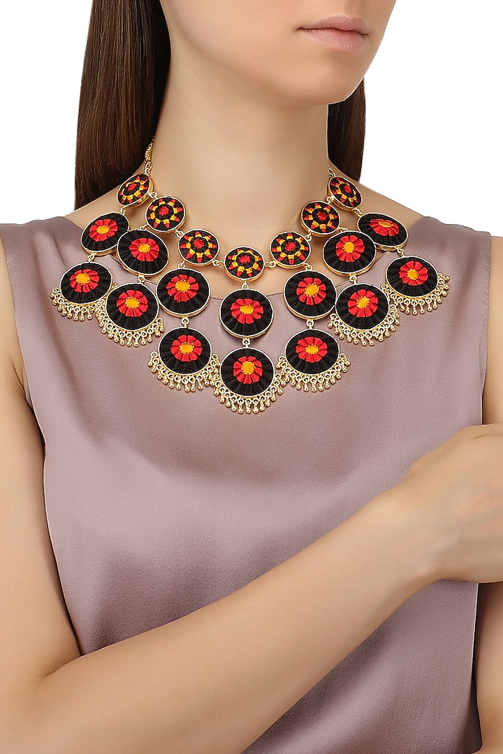 Matte finish circular three toned necklace available only at Pernia's Pop Up Shop.